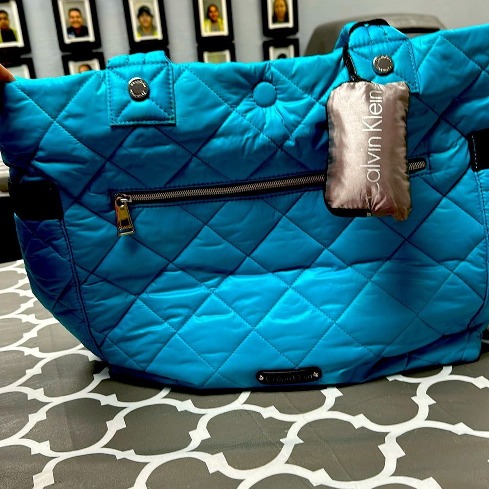 Used Calvin Klein quilted bag.